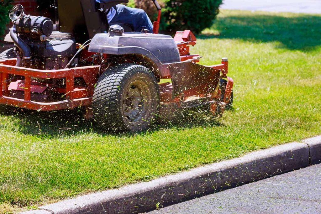 how low to mow before aerating lawn